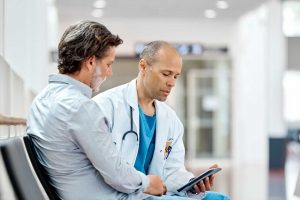 Doctor using sentactkiosk to capture patient feedback at the hospital